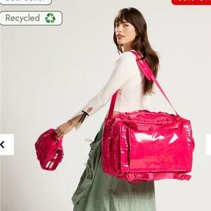 CALPAK 50L Duffle BAG WITH matching Toiletry Bag Dragon Fruit USED ONCE